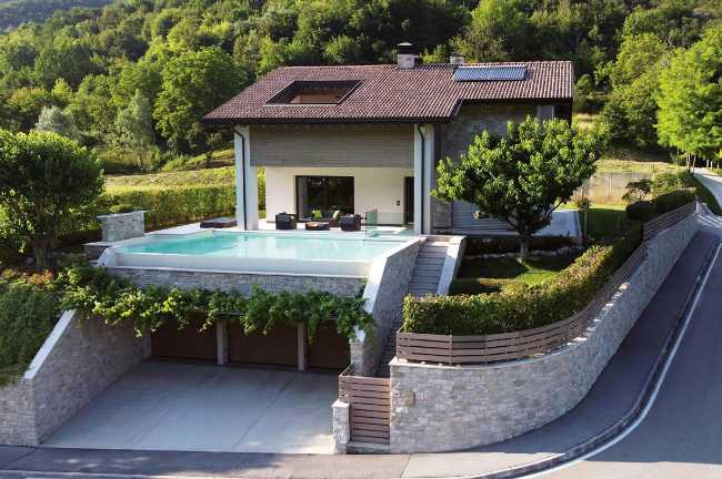 Villa contemporaine en pierre reconstruite : dialogue entre nature et design