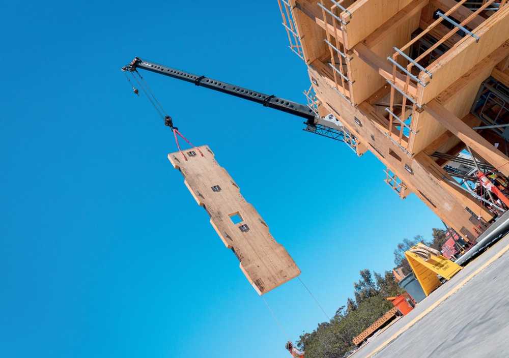 Edifici multipiano con strutture in legno in zona sismica. Esperienze di ricerca e casi studio