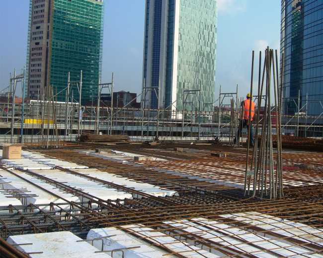 Formwork panels with lightened concrete elements